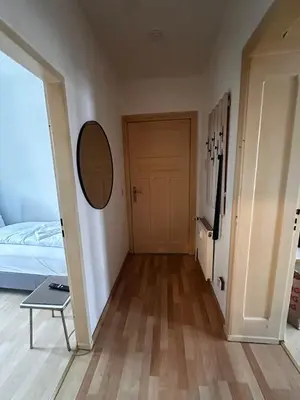 Ein Bett oder Betten in einem Zimmer der Unterkunft 2-Zi-Wohnung und Parkplatz für Geschäftsreisende