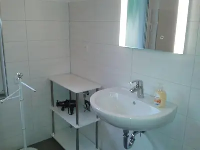 Ein Badezimmer in der Unterkunft at the bathing meadow Grimnitzsee