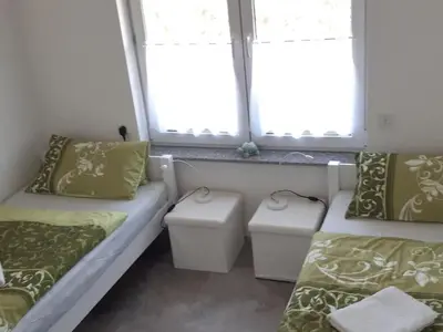 Ein Bett oder Betten in einem Zimmer der Unterkunft at the bathing meadow Grimnitzsee