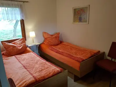 Ein Bett oder Betten in einem Zimmer der Unterkunft Bungalow nahe Lübbesee