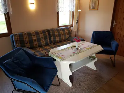 Ein Sitzbereich in der Unterkunft Bungalow nahe Lübbesee