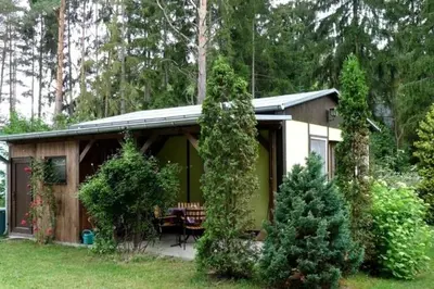 Ein Garten an der Unterkunft Ferienhaus nahe Stechlinsee