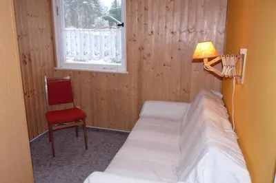 Ein Bett oder Betten in einem Zimmer der Unterkunft Ferienhaus nahe Stechlinsee