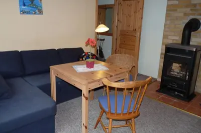 Ein Sitzbereich in der Unterkunft Ferienhaus beim Stechlinsee
