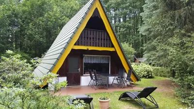 Ein Garten an der Unterkunft Finnhütte am Lübbesee
