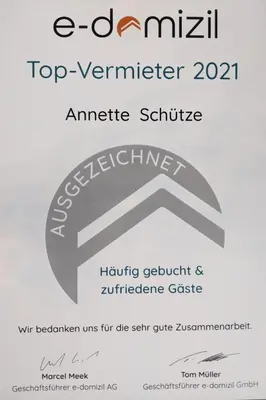 Ein Zertifikat, Auszeichnung, Logo oder anderes Dokument, das in der Unterkunft Apartment Schütze by Interhome ausgestellt ist