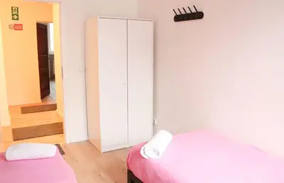 Ein Bett oder Betten in einem Zimmer der Unterkunft Stilvolle 6 Zimmer Ferienwohnung mit 2 Bädern