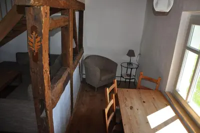 Ein Bett oder Betten in einem Zimmer der Unterkunft Kutscherwohnung im Arbeiterhaus – urigste Ferienwohnung