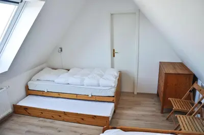 Ein Bett oder Betten in einem Zimmer der Unterkunft Hirtenwohnung im Arbeiterhaus