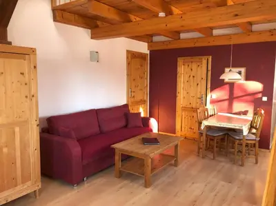 Ein Sitzbereich in der Unterkunft Ferienwohnung Wandersruh