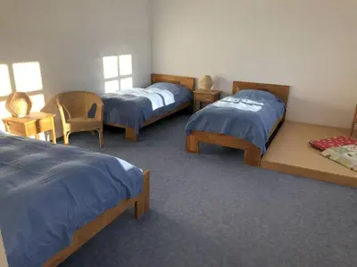 Ein Bett oder Betten in einem Zimmer der Unterkunft Hugenottenwohnung im Bauernhaus - Platz für größere Familien
