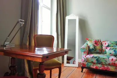 Ein Sitzbereich in der Unterkunft Schloss Blankensee Gästezimmer