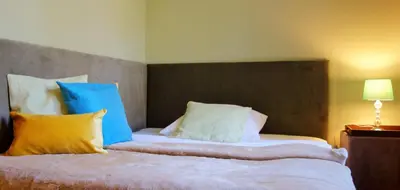 Ein Bett oder Betten in einem Zimmer der Unterkunft Schloss Blankensee Gästezimmer