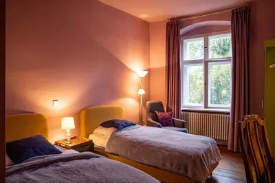 Ein Bett oder Betten in einem Zimmer der Unterkunft Schloss Blankensee Gästezimmer