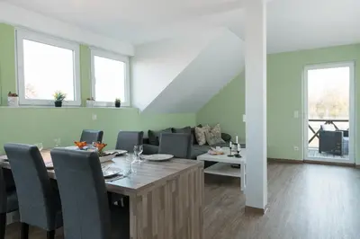Ein Sitzbereich in der Unterkunft 4-Raum-Apartment - Disney Plus WLAN Parkplatz