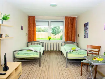 Ein Sitzbereich in der Unterkunft Family-Friendly Guesthouse in the Oderbruch