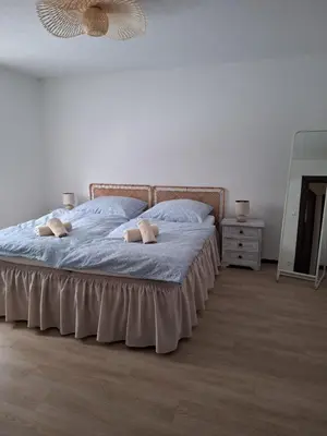 Ein Bett oder Betten in einem Zimmer der Unterkunft Stadt Land Ferienhaus