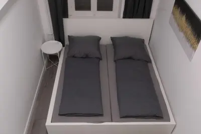 Ein Bett oder Betten in einem Zimmer der Unterkunft Cozy place in Rixdorf
