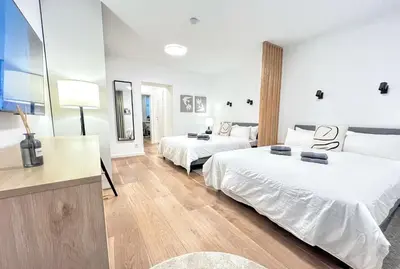 Ein Bett oder Betten in einem Zimmer der Unterkunft Katzbach - Design Flats with Self Check-In