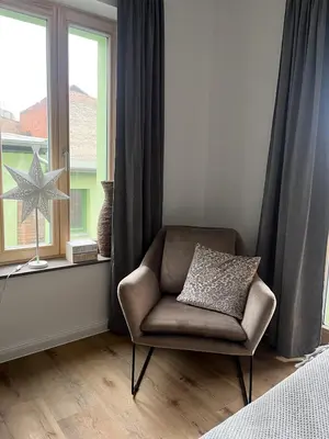 Ein Sitzbereich in der Unterkunft Altstadtflair Modernes Studio mit Gartenblick