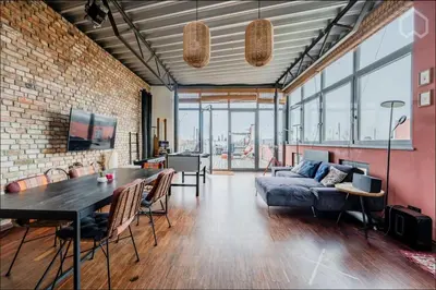 Ein Sitzbereich in der Unterkunft Designer Loft with Big Rooftop and Office