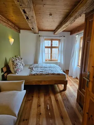 Ein Bett oder Betten in einem Zimmer der Unterkunft Ferienwohnung am Rosenbusch