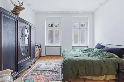 Ein Bett oder Betten in einem Zimmer der Unterkunft Cozy spacious family home in trendy Neukölln