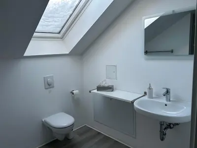 Ein Badezimmer in der Unterkunft Zimmervermietung