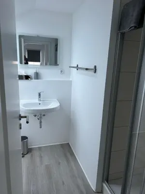 Ein Badezimmer in der Unterkunft Zimmervermietung