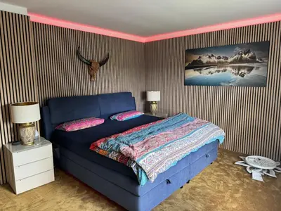 Ein Bett oder Betten in einem Zimmer der Unterkunft Large house in a quiet location