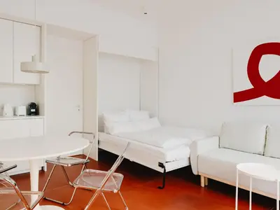 Ein Bett oder Betten in einem Zimmer der Unterkunft NOOK Stay architectural hideway in Friedrichshain