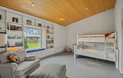 Ein Bett oder Betten in einem Zimmer der Unterkunft Annenwalde Country House 4 bedrooms with Sauna