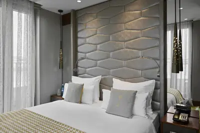 Ein Bett oder Betten in einem Zimmer der Unterkunft TITANIC Chaussee Berlin