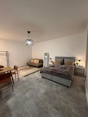 Ein Bett oder Betten in einem Zimmer der Unterkunft Cozy Studio Steglitz Sleeps 4 Near center