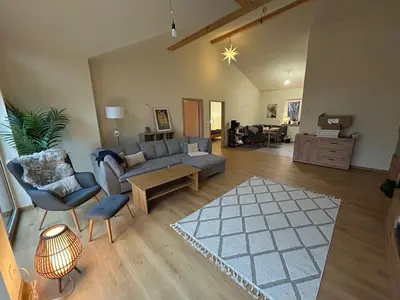 Ein Sitzbereich in der Unterkunft Ferienhaus Senzig Waldesruh