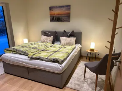 Ein Bett oder Betten in einem Zimmer der Unterkunft Ferienhaus Senzig Waldesruh
