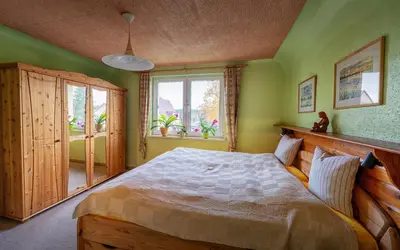 Ein Bett oder Betten in einem Zimmer der Unterkunft Gästehaus Barthel
