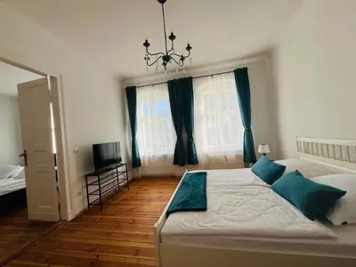 Ein Bett oder Betten in einem Zimmer der Unterkunft Besondere Ferienwohnung am Rande der Hauptstadt