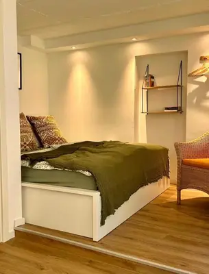 Ein Bett oder Betten in einem Zimmer der Unterkunft Ferienwohnung Oranienburg
