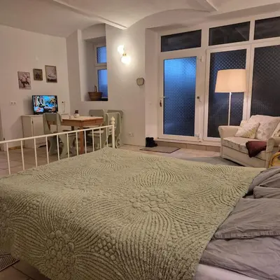 Ein Bett oder Betten in einem Zimmer der Unterkunft Cozy apartment in Berlin