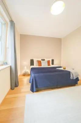 Ein Bett oder Betten in einem Zimmer der Unterkunft Luxus Apartment am Ku'damm - 2 Zimmer