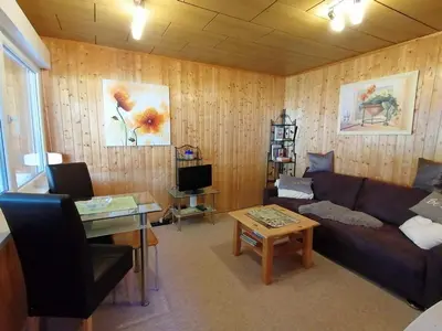 Ein Sitzbereich in der Unterkunft Bungalow am Ferchesarer See