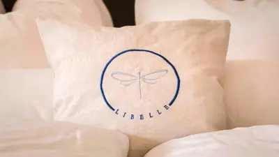 Ein Bett oder Betten in einem Zimmer der Unterkunft Libelle