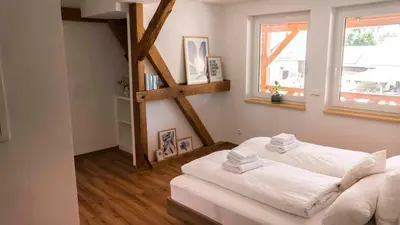 Ein Bett oder Betten in einem Zimmer der Unterkunft Libelle