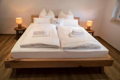 Ein Bett oder Betten in einem Zimmer der Unterkunft Bauernhof
