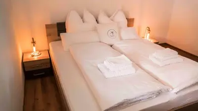 Ein Bett oder Betten in einem Zimmer der Unterkunft Schwalbennest