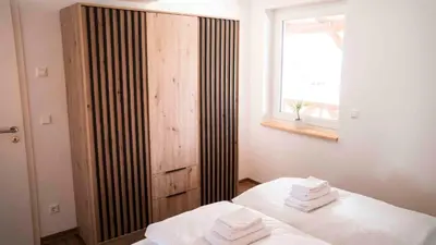 Ein Bett oder Betten in einem Zimmer der Unterkunft Schwalbennest