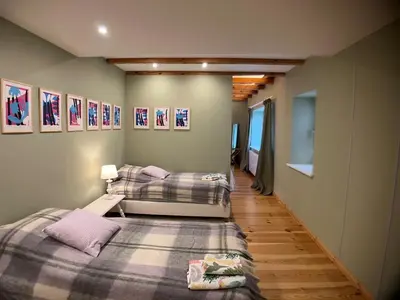 Ein Bett oder Betten in einem Zimmer der Unterkunft Cottage