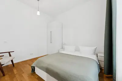Ein Bett oder Betten in einem Zimmer der Unterkunft Arbio I 1Bedroom with Piano Prenzlauer Berg Berlin