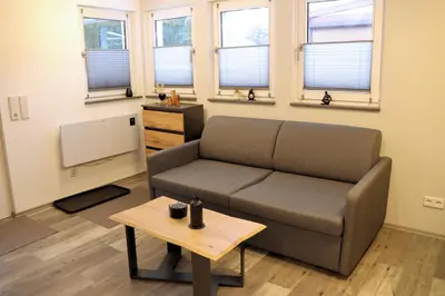 Ein Sitzbereich in der Unterkunft Ferienbungalow Marie